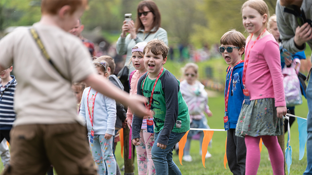 Children playing games at Warwick Castle at Boundless Member's Day